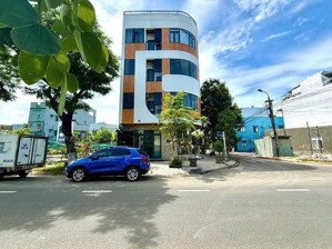 bán toà căn hộ mới xây - lô góc 2 mặt tiền sát biển sơn trà - doanh thu 140tr/tháng