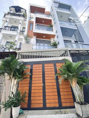 nhà 4x15m đúc 4 tầng hẻm xe hơi đường thống nhất bên cạnh bờ kè than lương