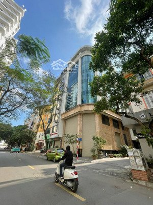toà building lô góc trung kính đôi, full kính 100m2 7 tầng có hầm thông sàn thang máy 66tr/th