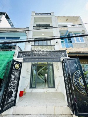 nhà mới xây 162m2 - đối diện chợ bình chánh - 3 tầng