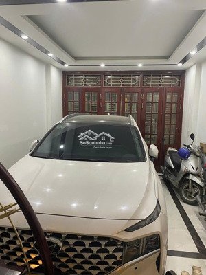 nhà đẹp ngõ ô tô tránh kinh doanh cách phố tố hữu 20m, kết câu 5 tầng có gara ô tô diện tích 58m.
