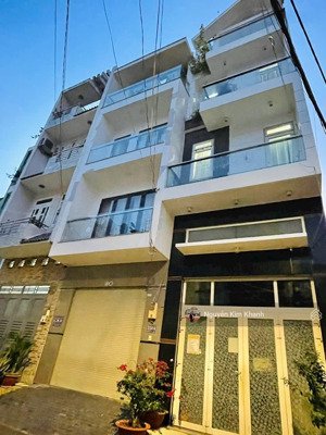 đối diện vincom nguyễn xí - hxh 8m quay đầu - 5 tầng có hầm oto - tương lai ra mt rạch xuyên tâm