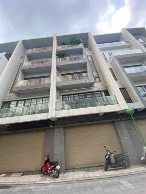 cho thuê nhà lk định công, nhà mới hoàn thiện, dt 90m*5 tầng, thông sàn, thang máy, giá 36tr/th