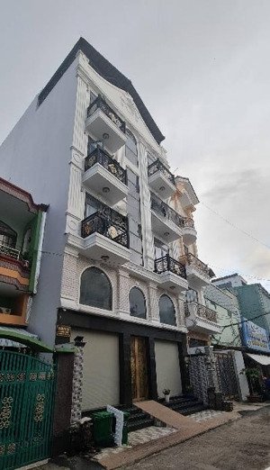 bán nhà mặt tiền đường nhựa 8 kdc lý chiêu hoàng - nhà mới 6 tầng dòng tiền khai thác tới 120 triệu