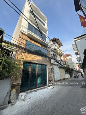 bán nhà phường long biên lô góc 50m2 x 5 tầng ô tô 7 chỗ vào nhà ngõ thông kinh doanh tốt