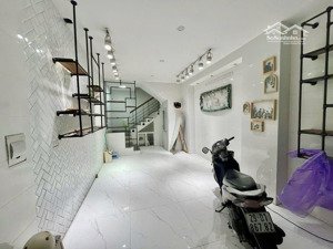 bán nhà phố xã đàn 33m2 xây 6 tầng nhà mặt ngõ thông kinh doanh cách mặt phố 20m giá 8,28 tỷ