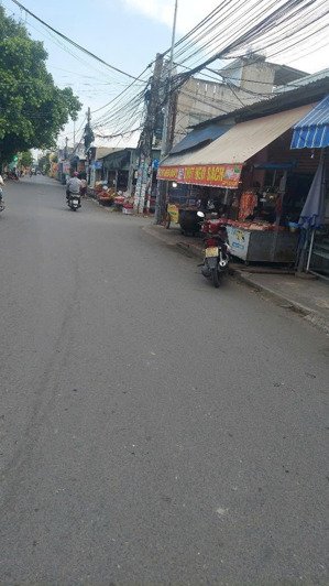 nhà mặt tiền cây da tân bình dĩ an kinh doanh buôn bán diên tích 102m gia 5ty5 tl lh 