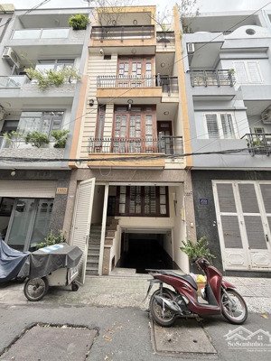 nhà mặt tiền hoa lan phú nhuận - 1 hầm + 4 tầng - giá tốt.