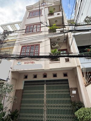 bán căn nhà 4 tầng thiết kế nhiều phòng cho thuê sát biển khu phố tây, hẻm ô tô đường hùng vương