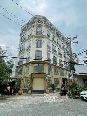 nhà đẹp - giá tốt! góc 2 mặt tiền phổ quang (7x26m), hầm 5 tầng, hđt 110tr/tháng - giá chỉ 26,5 tỷ