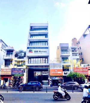 vị trí đẹp đối diện novaland, mặt tiền phổ quang, dt: 5x18m, hầm + 4 tầng, giá 25.5 tỷ