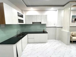 cần bán nhà 1 trệt 1 lầu man thiện, q9