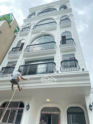 29 phòng, himlam q7 - vị trí siêu đẹp - 6 tầng,chdv - thang máy - dòng tiền 200tr/tháng