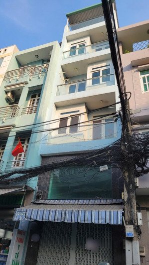 mặt tiền nguyễn giản thanh, p15, quận 10. dt: 4x12m, 4 lầu, 4pn, 4wc.