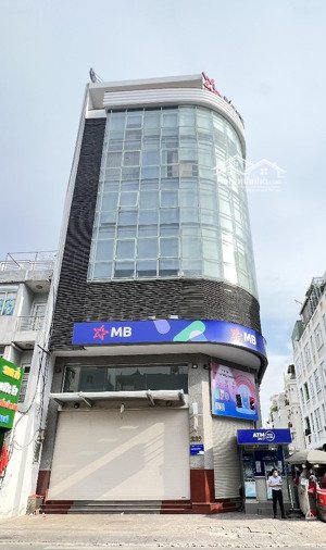 bán toà nhà ngay mặt tiền lê quang định p14 bình thạnh hdt 250tr/th- dt 10x22 hầm 7 tầng -giá 46tỷ.