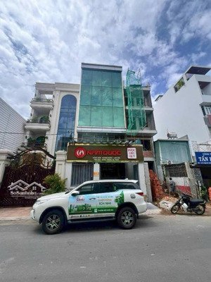 bán tòa nhà mặt tiền nguyễn văn đậu. dt 930m2 (31x30m), 8 tầng, hđt 390tr. giá 130 tỷ tl - tin thật