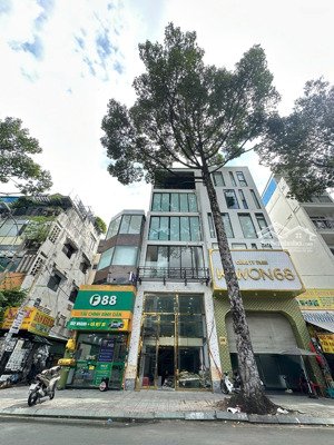 tòa nhà building mặt tiền đường trần quang khải q1 - dt 6x20 - trệt 6 tầng thang máy 