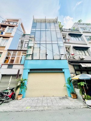 siêu phẩm mặt tiền ốp kinh cực sang 111 nguyễn giản thanh, p12, q10 - 5 tầng trống suốt dtsd 288m²