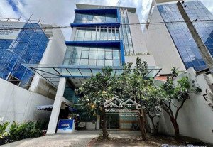 tòa nhà đường lê đức thọ 11x23m trệt 4 lầu cho thuê