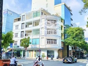 dòng tiền 3 tỷ/năm.bán nhà góc 2 mt lê quang định, p11, bt. dt: 13x25m (hầm+7 tầng)-giá 70 tỷ