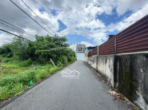 đất định hoà mặt tiền dx066. dt 6,67x35m. tổng 235 m2 thổ cư 60m2 nhựa thông gần tp. mới