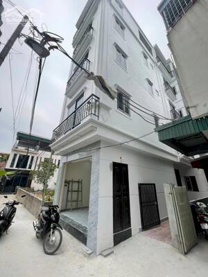 Bán nhà cạnh chợ trung tâm Tân Lập, Đan Phượng. Đơn lập 41m2 xây 5 tầng. Ngõ thông thoáng