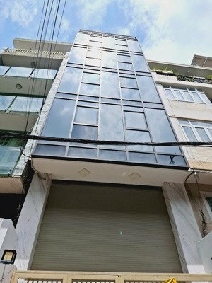 cho thuê tòa nhà văn phòng mới xây có thang máy .