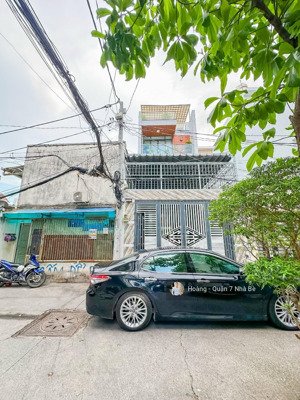 nhà hẻm xe hơi-dt 5mx28,5m-đường nguyễn thị thập-1trệt 2lầu sân thượng 4pn gara -gần bviện q7
