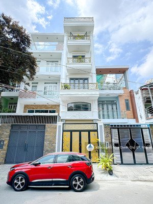 bán gấp nhà mới mặt tiền đường số tân quy, quận 7 - có tháng máy - đường thông - 18tỷ5