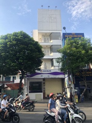 cho thuê nhà mặt tiền 60b đường hòa bình, phường 5 quận 11. diện tích 10x25m 1 trệt 4 lầu thang máy