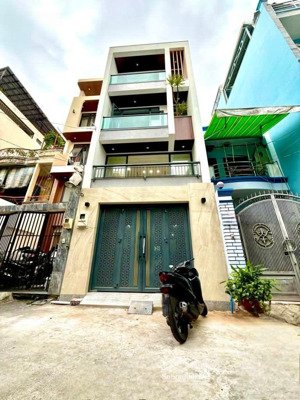 n mới hxh 6m ôtô vào nhà, gần mt q trung, ubnd gv, ngã 6 gv* thang máy 450kg *80m2*5tầng* hơn 12 ty