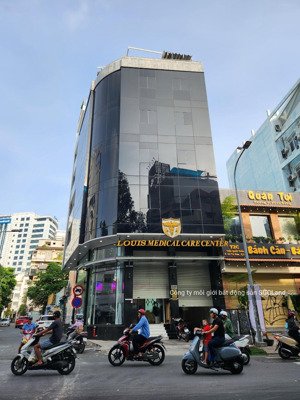 tòa nhà mt trần quang khải, tđ q1 - dt 22 x 28m, cn 615m2, hầm 4 tầng, hđt 680tr/th