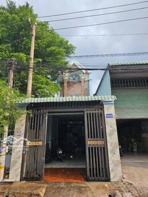 bán nhà mặt tiền kinh doanh gần chợ tân long, dĩ an