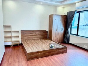 tòa chdv phố an trạch đống đa, 50m2*7t, 11 phòng, doanh thu 700 triệu/năm, căn góc, gần mặt phố