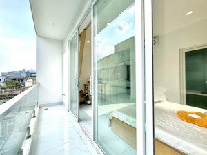 căn hộ mini có ban công , máy giặt riêng quận 7