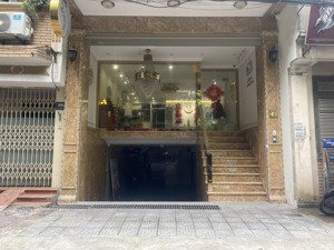 bán tòa nhà mặt đường tô hiệu - nghĩa tân dt 70m 9 tầng rộng 5,5m vỉa hè ôtô tránh 38 tỷ