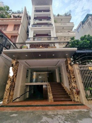 bán nhà phố lạc long quân dt: 100/135m2 t1, 9 tầng, mt: 5.8m 51.5 tỷ cầu giấy