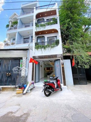 kẹt tiền bán nhà oto ở út tịch-p4-tân bình. giá 2tỷ990/73,2m2, cho thuê 18tr/tháng gần vincom