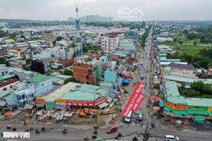 đất đẹp dt 112m mặt tiền đường nhựa 14m,cách lò lu 30m,khu dân cư đông,đầu tư, kinh doanh tốt