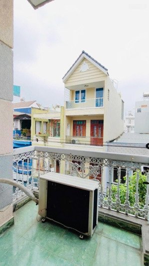 gấp bán nhà đẹp ở ngay 4 tầng 84m2( 5x17) hẻm 1/ to như đường xe tải tránh nhau phan huy ích