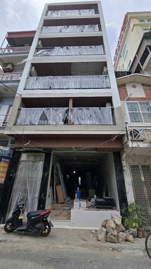 bán tòa chdv ccmn trường chinh | 6 tầng thang máy | dòng tiền ~100tr/tháng - ngõ ô tô