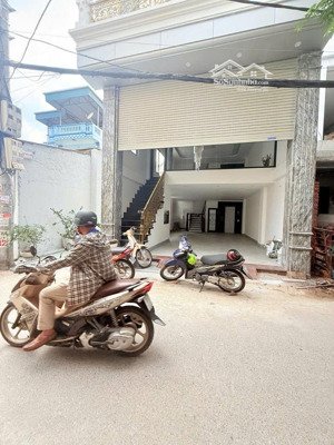 nhà lô góc phố trạm long biên 7 tầng thang máy gara oto tải 2.5 tấn 73m, mt 6m 23.3 tỏi.