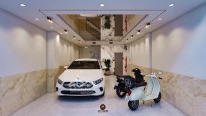 gấp!!!tôn đức thắng-đống đa-dt 75m2 x mt 5m-gara 3 oto- 8 tầng thang máy- ở và kinh doanh văn phòng