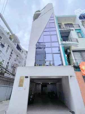 cho thuê tòa nhà góc 2mt hxh đào duy anh (ct,tm) cuối nhà