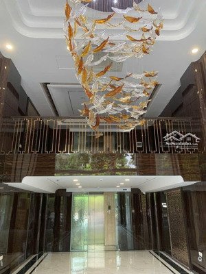 phố quang trung, tòa nhà 8t, mặt tiền 8m, đường 30m, thông sàn, dòng tiền 70tr, giá hơn 30 tỷ