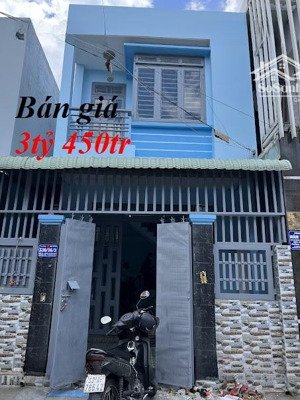 bán nhà 1 trệt 1 lầu gần trường học tân đông hiêp dĩ an