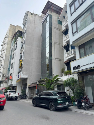 bán nhà trần thái tông - kinh doanh - 7 tầng có thang máy - ô tô vào nhà - 49m2