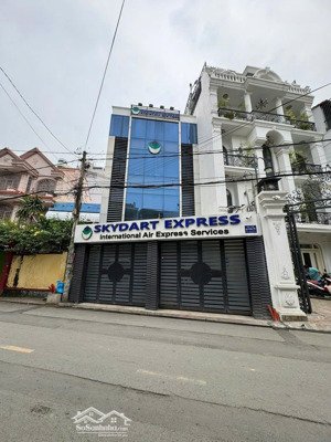 bán nhà mặt tiền trường sơn - dt: 11x28m - 3 tầng - xd: hầm + 8 lầu - giá bán: 45 tỷ tl - tin thật