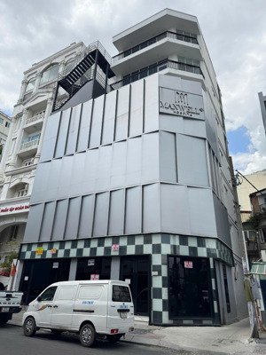 cho thuê tòa nhà góc 2 mặt tiền số 1 trần nhật duật, tân định quận 1 sát bên trần quang khải