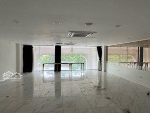 bán tòa văn phòng 10 tầng thang máy, mặt phố trần vỹ, vỉa hè rộng, 120m2 giá 89 tỷ
